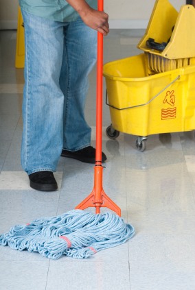 System4 of Chattanooga janitor in Chattanooga, TN mopping floor.